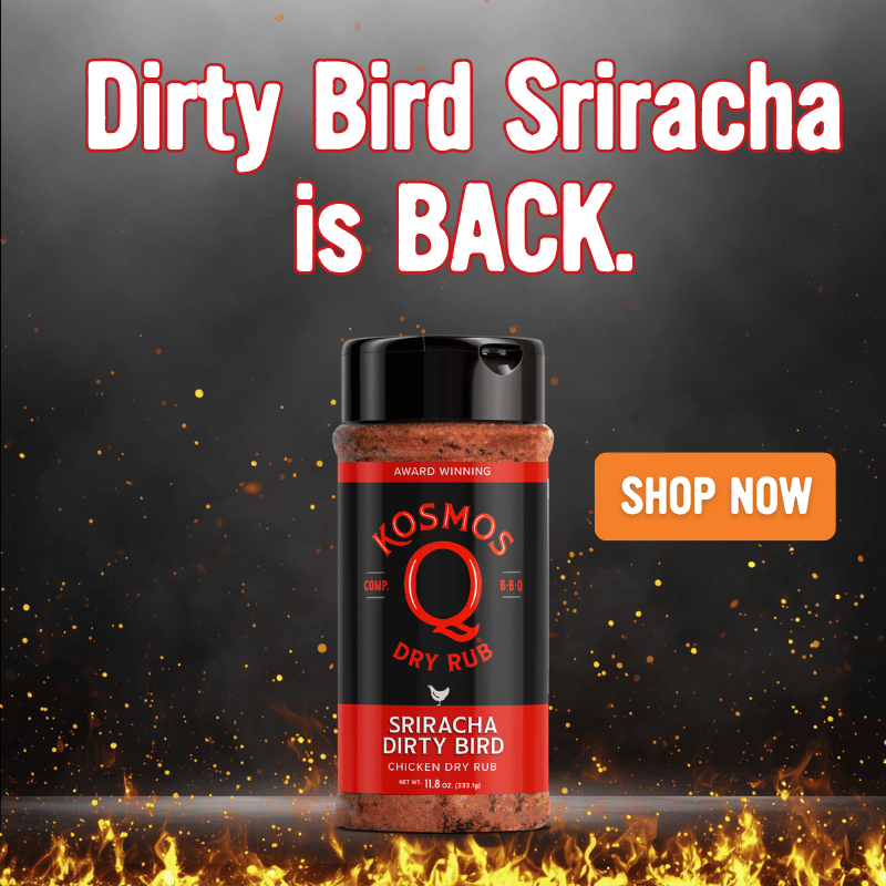 A bottle of Kosmos Dirty Bird Dry Rub spice rub stands centered against a dark smoky background with fiery sparks and flames along the bottom. Large text at the top reads 'Dirty Bird Sriracha is BACK.